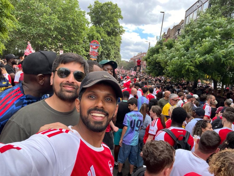 APSC members in the red sea outside the Emirates on matchday
